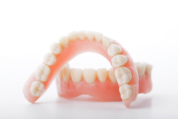 Broken Dentures: When To Get Them Replaced